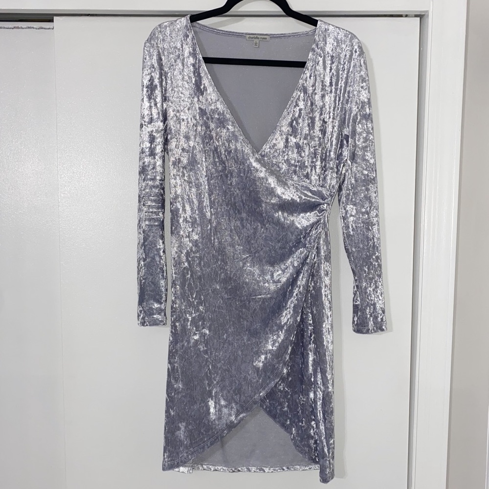 Grey mid-length dress.
